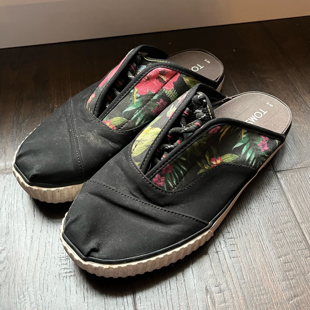 TOMS Black Slip-On Shoes with Floral Pattern